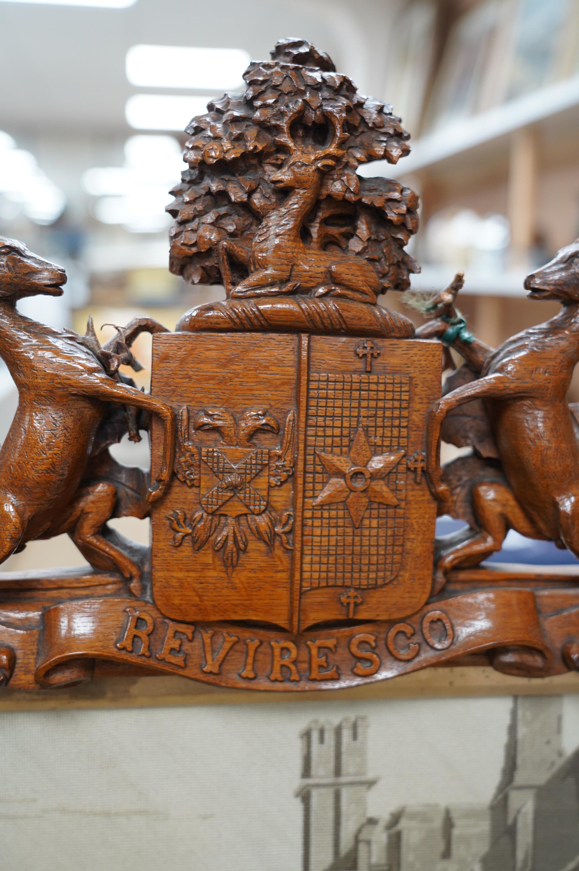 A large 19th century ornately carved oak fire screen, carved with hoof feet and a finely worked petite point panel of a Jacobean family preparing for a falconry hunt. 148cm high, 87cm wide, petite point panel 69cm wide,